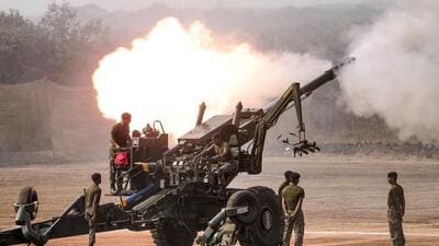 Indian Army soldiers operate a 155mm Bofors artillery gun during 'Exercise Topchi 2026' at Devlali in Nashik on Wednesday. (PTI)