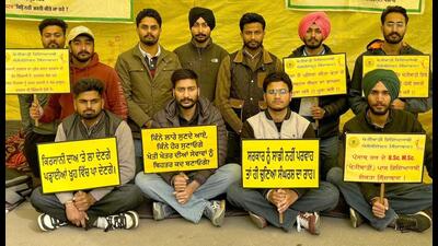 PAU students protest at the campus in Ludhiana on Wednesday. (HT Photo) PAU students protest at the campus in Ludhiana on Wednesday. (HT Photo)