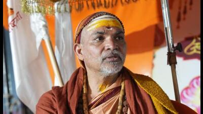 Swami Avimukteshwaranand at his camp in the Magh Mela in Prayagraj on Wednesday. (Anil K Maurya/HT Photo) Swami Avimukteshwaranand at his camp in the Magh Mela in Prayagraj on Wednesday. (Anil K Maurya/HT Photo)