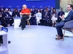 CEO of DeepMind Technologies Demis Hassabis and CEO and co-founder of Anthropic Dario Amodei talk during the 56th annual World Economic Forum meeting in Davos, Switzerland, on January 20. (Reuters)