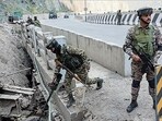 Central Reserve Police Force personnel keeping vigil on the Jammu-Srinagar National Highway (NH-44) in Ramban on Thursday ahead of the 77th Republic Day. (ANI)