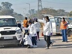 Chandigarh CFSL team investigating the encounter spot at Sector 39 grain market on Wednesday. (Keshav Singh/HT)