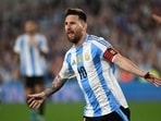 Lionel Messi celebrates after scoring a goal.