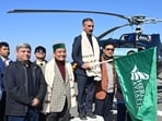Himachal chief minister Sukhvinder Singh Sukhu flagging off the helicopter services from the Sanjauli heliport in Shimla on Wednesday. (HT Photo)