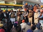 Police officials trying to pacify the protesters in Thikriwala village of Barnala on Wednesday.