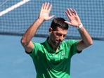 Serbia's Novak Djokovic celebrates beating Italy's Francesco Maestrelli. Serbia's Novak Djokovic celebrates beating Italy's Francesco Maestrelli.