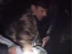 The man being rescued by cops. (Sourced)