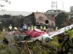 The wreckage of the ill-fated London-bound Air India flight on the rooftop of the doctors' hostel, in Ahmedabad. (ANI)