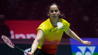 Saina Nehwal plays a return during a badminton game. (AP) Saina Nehwal plays a return during a badminton game. (AP)