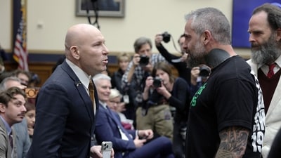 Ivan Raiklin (L) confronts former Metropolitan Police Department officer Michael Fanone during a recess in the testimony of Special Counsel Jack Smith (Getty Images via AFP) Ivan Raiklin (L) confronts former Metropolitan Police Department officer Michael Fanone during a recess in the testimony of Special Counsel Jack Smith (Getty Images via AFP)