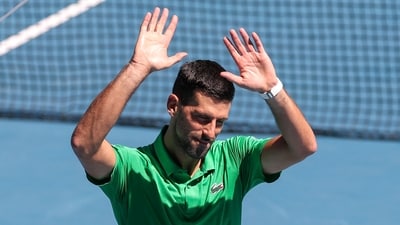 Serbia's Novak Djokovic celebrates beating Italy's Francesco Maestrelli. (AFP)