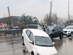 A car stuck on national highway near Basti Jodhewal in Ludhiana on Friday. (Gurpreet Singh/HT)