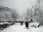 A view of Srinagar after the season's first heavy snowfall on Friday. (Waseem Andrabi/ HT Photo) A view of Srinagar after the season's first heavy snowfall on Friday. (Waseem Andrabi/ HT Photo)