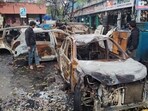 Charred remains of vehicles at the motor market in Manimajra on Friday. (Sant Arora/HT)