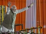 Prime Minister Narendra Modi waves to the gathering during a public meeting at Singur in Hooghly district, West Bengal, on Sunday, January 18, 2026. 