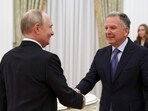 Russian President Vladimir Putin, left, shakes hands with Donald Trump's envoys Steve Witkoff during their meeting at the Senate Palace of the Kremlin, in Moscow.