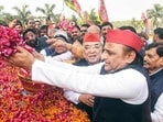 Samajwadi Party national president Akhilesh Yadav paying floral tribute on the occasion of Janeshwar Mishra’s death anniversary in Lucknow on Thursday. (ANI PHOTO)