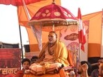 Swami Avimukteshwaranand Saraswati continues his sit-in for the fifth day at the Magh Mela, in Prayagraj on Thursday. (Anil K Maurya/HT Photo) Swami Avimukteshwaranand Saraswati continues his sit-in for the fifth day at the Magh Mela, in Prayagraj on Thursday. (Anil K Maurya/HT Photo)