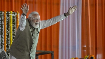 Prime Minister Narendra Modi waves to the gathering during a public meeting at Singur in Hooghly district, West Bengal, on Sunday, January 18, 2026. (PTI ) Prime Minister Narendra Modi waves to the gathering during a public meeting at Singur in Hooghly district, West Bengal, on Sunday, January 18, 2026. (PTI )
