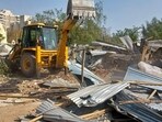 A demolition drive carried out by HSVP on a four acre plot in Sector 57, in Gurugram in April last year. (Parveen Kumar/HT)