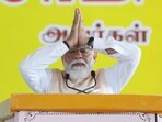 Prime Minister Narendra Modi greets the gathering during a public rally, in Madhuranthakam on Friday.
