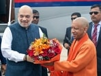 Union Home Minister Amit Shah receives a warm welcome from  Uttar Pradesh Chief Minister Yogi Adityanath, in Lucknow on Saturday.