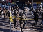 Federal immigration officers deploy pepper spray at protesters after a shooting Saturday, Jan. 24, 2026, in Minneapolis. Federal immigration officers deploy pepper spray at protesters after a shooting Saturday, Jan. 24, 2026, in Minneapolis.