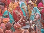 As is tradition, a baton, known as the ‘daanda’, is installed on temple premises across Braj on Basant Panchami to signify the commencement of the Holi festival. (HT File)