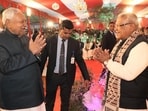Bihar Chief Minister Nitish Kumar with Union Minister Jitanram Manjhi during 'Litti with Manjhi' programme at Manjhi's residence in Patna on Saturday. (HT Photo)