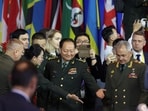 File photo of China's Central Military Commission Vice Chairman Zhang Youxia (middle) and Russian Defence Minister Sergei Shoigu in Beijing.