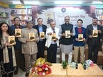 Deputy chief minister Brajesh Pathak releasing the book “Rails Through Raj” at Universal Booksellers in Gomti Nagar, Lucknow, on Saturday (HT Photo)