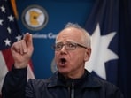 Gov. Tim Walz speaks during a news conference to respond to the shooting involving a federal law enforcement agent 