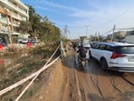 The two-kilometre stretch sees waterlogging during monsoon, posing risks to pedestrians and two-wheeler riders. (HT)
