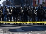 Federal agents block off the scene of a shooting on January 24, 2026 in Minneapolis, Minnesota. Agents allegedly shot a protestor amid a scuffle to arrest him. Stephen Maturen/Getty Images/AFP (Photo by Stephen Maturen / GETTY IMAGES NORTH AMERICA / Getty Images via AFP) Federal agents block off the scene of a shooting on January 24, 2026 in Minneapolis, Minnesota. Agents allegedly shot a protestor amid a scuffle to arrest him. Stephen Maturen/Getty Images/AFP (Photo by Stephen Maturen / GETTY IMAGES NORTH AMERICA / Getty Images via AFP)