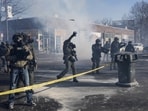 Federal agents during scuffles at the scene of a shooting involving federal immigration agents in Minneapolis, Minnesota, U.S., January 24, 2026.
