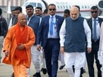 Uttar Pradesh chief minister Yogi Adityanath with Union home minister Amit Shah in Lucknow. (ANI)