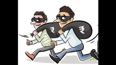 Burglars targeted the car of the in-charge of the arms licence branch of the police commissionerate in the city and decamped with his service weapon, passport and  ₹10,000 in cash. (HT Photo)