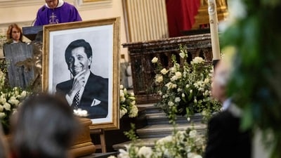 A portrait of late Italian fashion designer Valentino Gavarani is seen during his funeral ceremony at the Basilica of Santa Maria degli Angeli e dei Martiri, in Rome, on January 23, 2026. The designer passed away peacefully at his home in Rome on January 19 at the age of 93.&nbsp; (AFP)