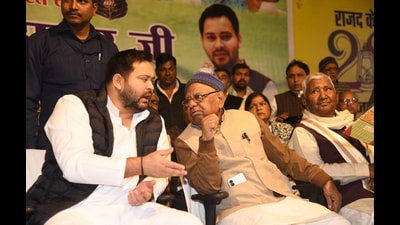 Leader of Opposition and RJD leader Tejashwi Yadav with party state president Mangani Lal Mandal during Jannayak Karpoori Thakur Jayanti Samaroh at RJD office in Patna on Saturday. (Santosh Kumar/HT) Leader of Opposition and RJD leader Tejashwi Yadav with party state president Mangani Lal Mandal during Jannayak Karpoori Thakur Jayanti Samaroh at RJD office in Patna on Saturday. (Santosh Kumar/HT)