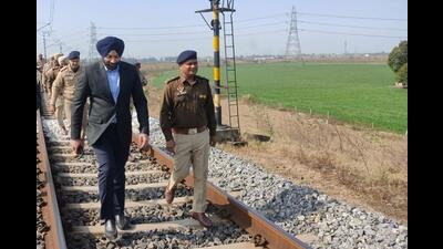 Ropar Range deputy inspector general (DIG) Nanak Singh and other police officials at the site of the blast near Sirhind in Fatehgarh Sahib district on Saturday. Ropar Range deputy inspector general (DIG) Nanak Singh and other police officials at the site of the blast near Sirhind in Fatehgarh Sahib district on Saturday.