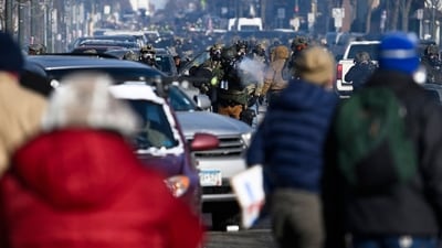 A federal agent fires tear gas at protestors after federal agents allegedly shot a protestor amid a scuffle to arrest him on January 24, 2026 in Minneapolis, Minnesota. The Trump administration has sent a reported 3,000 federal agents into the area, with more on the way, as they make a push to arrest undocumented immigrants in the region. (Getty Images via AFP) A federal agent fires tear gas at protestors after federal agents allegedly shot a protestor amid a scuffle to arrest him on January 24, 2026 in Minneapolis, Minnesota. The Trump administration has sent a reported 3,000 federal agents into the area, with more on the way, as they make a push to arrest undocumented immigrants in the region. (Getty Images via AFP)