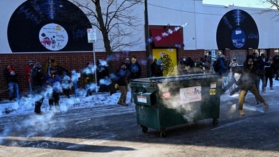 Gas canisters deployed by law enforcement fly through the air as demonstators gather near the site of where state and local authorities say a man was shot and killed by federal agents earlier in the morning in Minneapolis, Minnesota, on January 24, 2026. Minnesota Governor Tim Walz said Saturday that federal agents deployed in Minneapolis as part of a sweeping immigration crackdown had carried out "another horrific shooting," less than three weeks after the fatal shooting of Renee Good. (Photo by ROBERTO SCHMIDT / AFP) (AFP) Gas canisters deployed by law enforcement fly through the air as demonstators gather near the site of where state and local authorities say a man was shot and killed by federal agents earlier in the morning in Minneapolis, Minnesota, on January 24, 2026. Minnesota Governor Tim Walz said Saturday that federal agents deployed in Minneapolis as part of a sweeping immigration crackdown had carried out "another horrific shooting," less than three weeks after the fatal shooting of Renee Good. (Photo by ROBERTO SCHMIDT / AFP) (AFP)