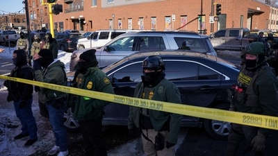 Federal agents stand guard at the scene of a shooting involving federal immigration agents, in Whittier neighborhood, in South Minneapolis, Minnesota, U.S., January 24, 2026. REUTERS/Seth Herald (REUTERS)