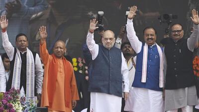 Union home minister Amit Shah with chief minister Yogi Adityanath, deputy CMs Keshav Prasad Maurya and Brajesh Pathak, and BJP state president Pankaj Chaudhary during the inaugural ceremony of 75th UP Diwas at Rashtra Prerna Sthal in Lucknow on Saturday. (Deepak Gupta/HT)
