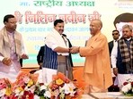 BJP national president Nitin Nabin being welcomed by chief minister Yogi Adityanath, during a programme organised to welcome him upon his first arrival in Vrindavan, on Sunday. (Sourced)