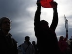 A person holds a sign for Keith Porter, who was shot and killed by an off-duty ICE agent in 2025, at a protest and rally on Sunday, Jan. 11, 2026, in Seattle. (AP Photo/Lindsey Wasson) A person holds a sign for Keith Porter, who was shot and killed by an off-duty ICE agent in 2025, at a protest and rally on Sunday, Jan. 11, 2026, in Seattle. (AP Photo/Lindsey Wasson)