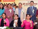 Uttar Pradesh chief electoral officer Navdeep Rinwa (in white coat) and others at an event on National Voters’ Day. (Sourced)