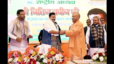 BJP national president Nitin Nabin being welcomed by chief minister Yogi Adityanath, during a programme organised to welcome him upon his first arrival in Vrindavan, on Sunday. (Sourced)