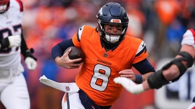 Denver Broncos quarterback Jarrett Stidham (8) scrambles against the New England Patriots (AP) Denver Broncos quarterback Jarrett Stidham (8) scrambles against the New England Patriots (AP)