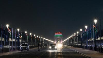 Security on high alert in front of the illuminated Kartavya Path and India Gate on the eve of Republic Day. (Arvind Yadav/HT Photo) Security on high alert in front of the illuminated Kartavya Path and India Gate on the eve of Republic Day. (Arvind Yadav/HT Photo)